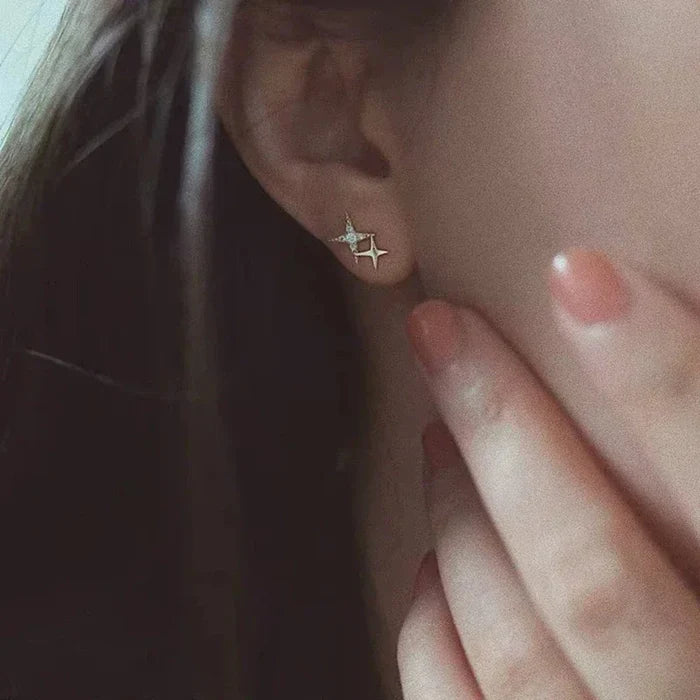 Fashion Earrings with a Stellar Twist: gold, clear/white star, minimal celestial style