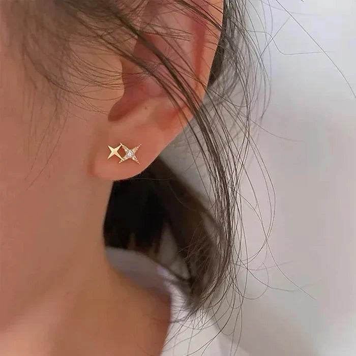 Fashion Earrings with a Stellar Twist: gold, clear/white star, minimal celestial style