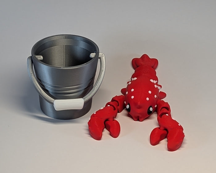Red Lobster and Pail Set On Table