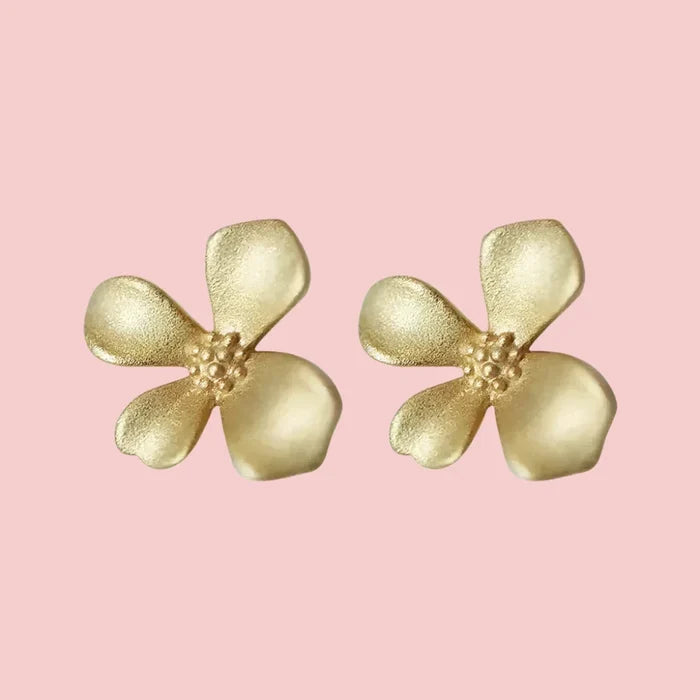 Floral Stud Earrings for a Subtle and Elegant Look: gold, pale pink background flower, minimal floral style