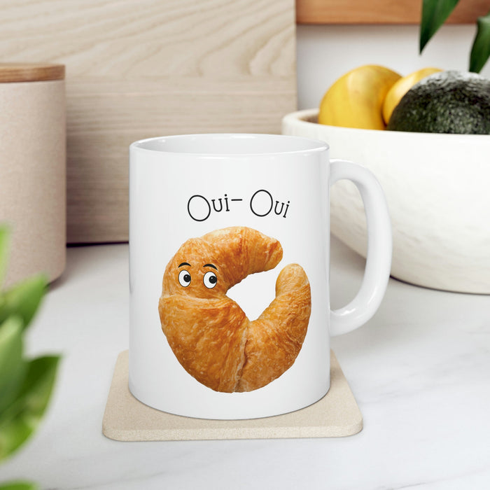 French Croissant Themed Novelty Mug: white, golden brown cartoon croissant