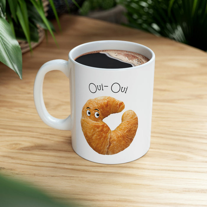 French Croissant Themed Novelty Mug: white, golden brown cartoon croissant
