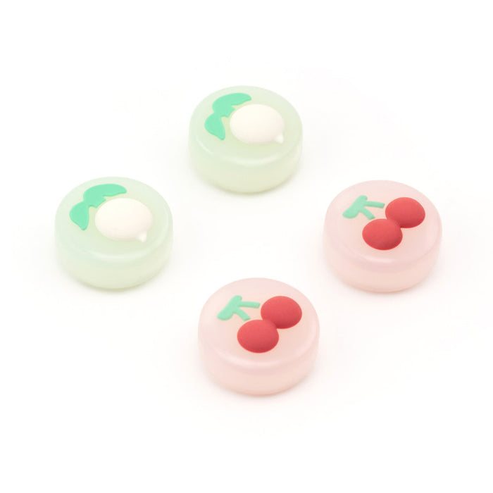 Fruit Switch Thumb Grips for Nintendo Switch: pale yellow, orange carrot and pineapple motifs, cute cartoon style