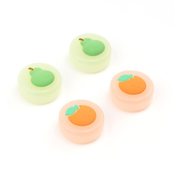 Fruit Switch Thumb Grips for Nintendo Switch: pale yellow, orange carrot and pineapple motifs, cute cartoon style