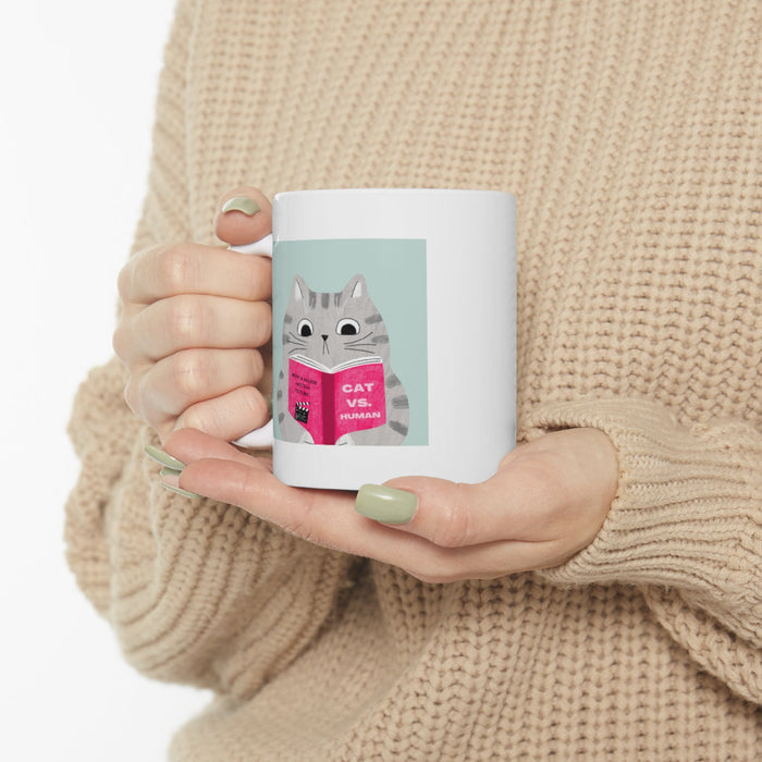 Funny Mug: Cat Versus Human Laughs: white, gray cartoon gray cat