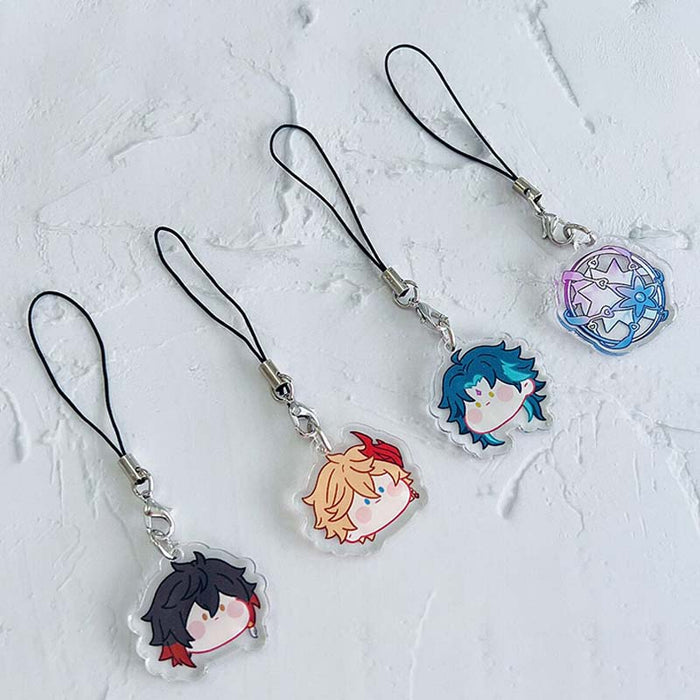 Genshin Impact Charms with Cute Designs: black, silver anime-style character faces and a circular star-themed emblem, kawaii