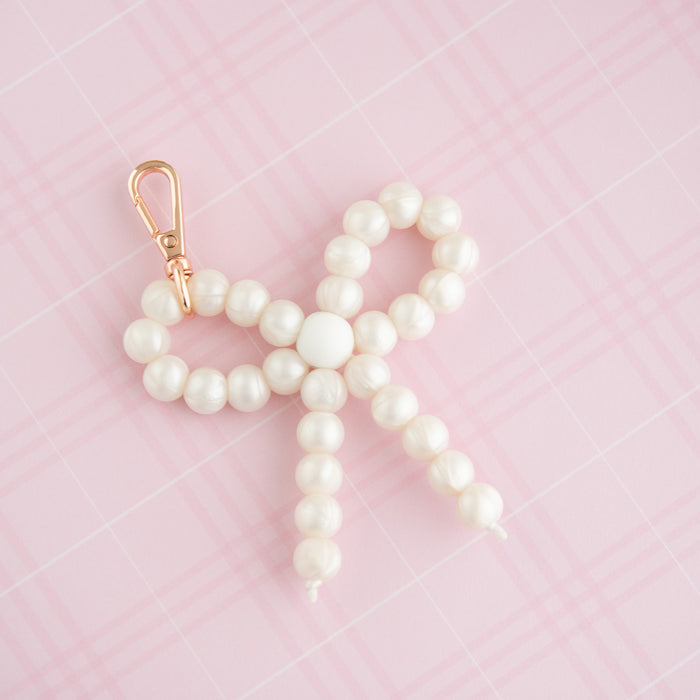 Shop the Image Glimmer Bow Charm Silicone Beads