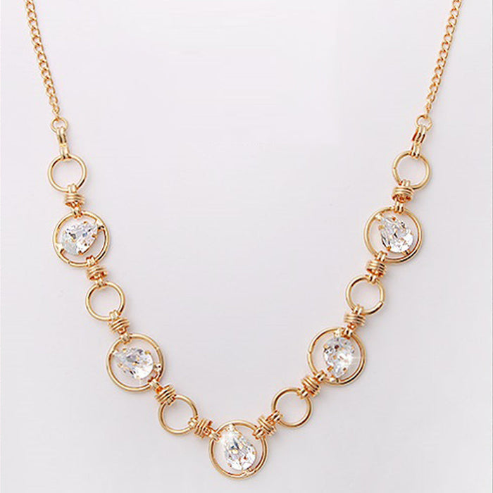 Gold Crystal Mika Necklace: gold, clear necklace, ornate style