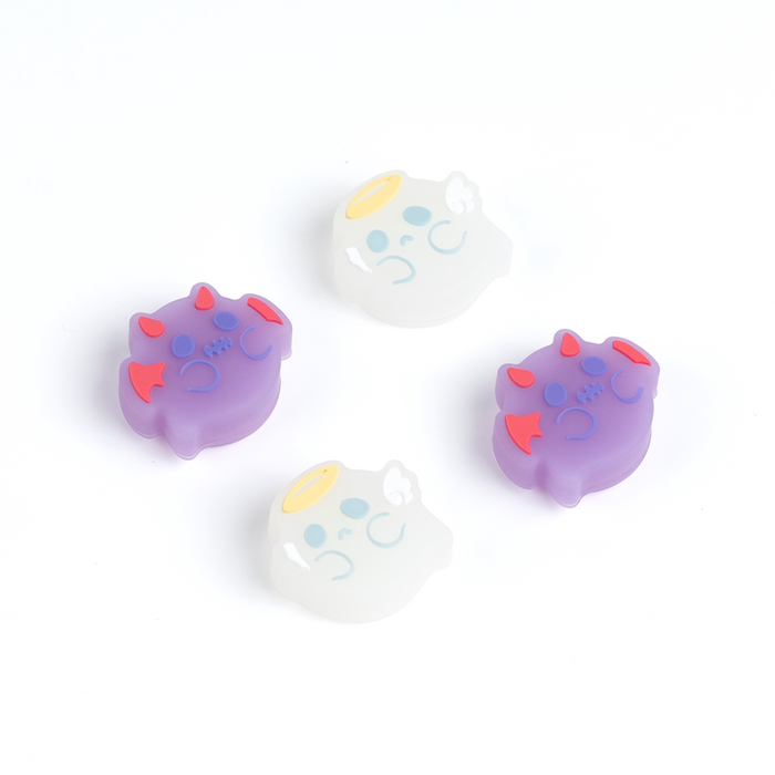 Halloween Ghost Thumb Grips for Switch: light blue, mint green cartoon ghost/skull-like face, cute cartoon style