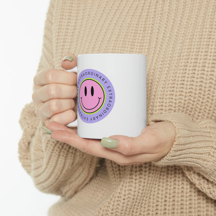 Happy Face Extraordinary Coffee Tea Mug: white, purple smiley face graphic with "EXTRAORDINARY" text, cartoon, cheerful style