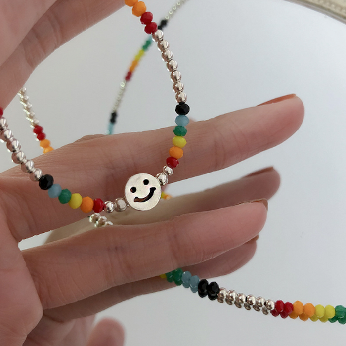 Happy Face Women's Beaded Necklace in Vibrant Colors: silver, multicolor smiley face, playful, colorful style