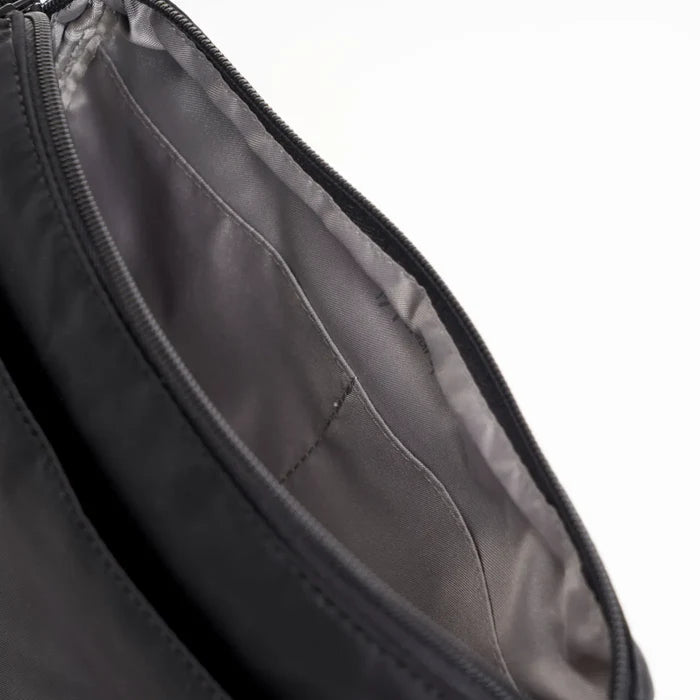 Black nylon Hedgren EYE crossbody bag with internal zippered compartment and adjustable shoulder strap for easy carry