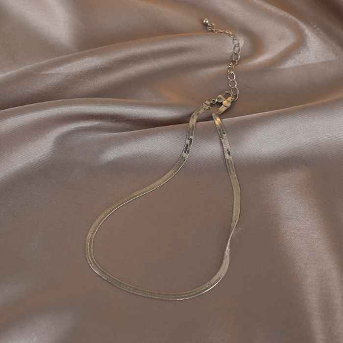 Herringbone Women's Necklace: black asymmetrical camisole top, minimal style