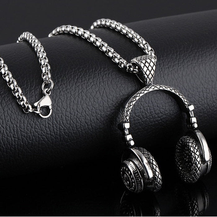 Hip Hop Necklace: A Stylish Headphone Pendant: silver, black headphones, detailed miniature accessory style