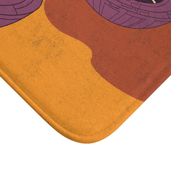 Home Accents UFO Bath Mat with Illuminating Light: orange, yellow UFOs flying over a grassy landscape, retro cartoon style