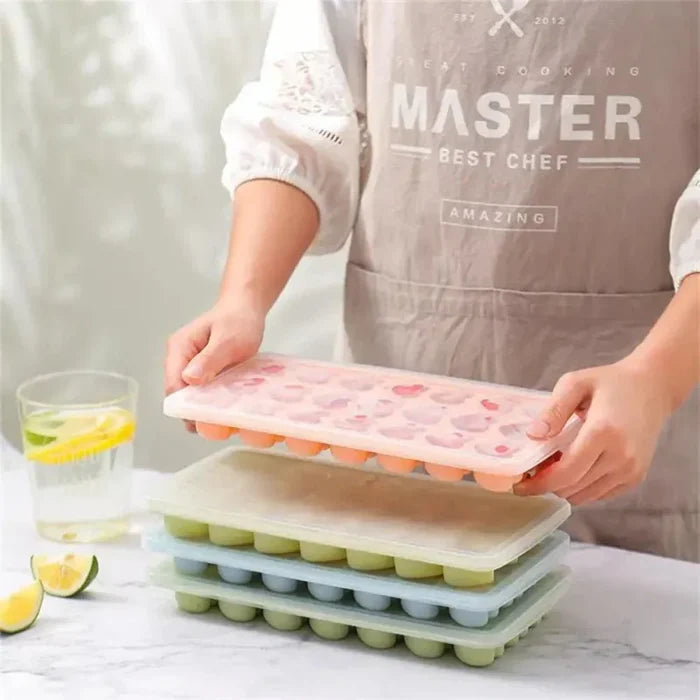 Ice Mold in the Shape of a Heart: peach pink, orange heart-shaped ice cube mold tray, minimal style