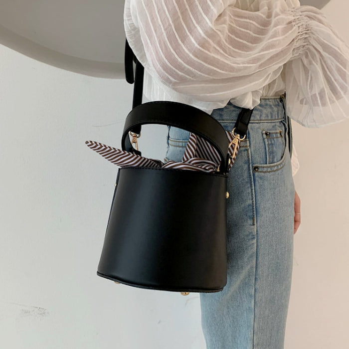Inner Striped Bucket Bag: black, brown handbag, minimal modern style
