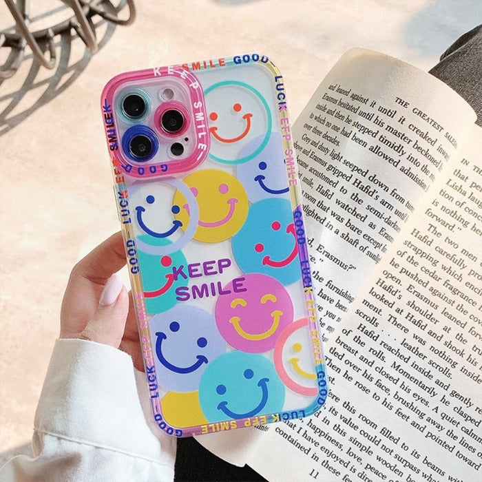iPhone Case with a Happy Face Design: clear, pink smiley face theme, kawaii cartoon style