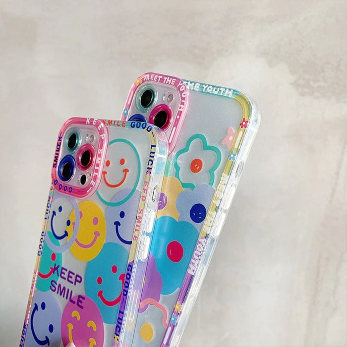 iPhone Case with a Happy Face Design: clear, pink smiley face theme, kawaii cartoon style