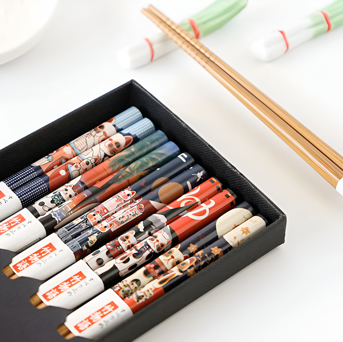 Japanese Wooden Chopsticks: black, red Japanese-style cartoon/graphic motifs, Japanese-inspired decorative graphic style