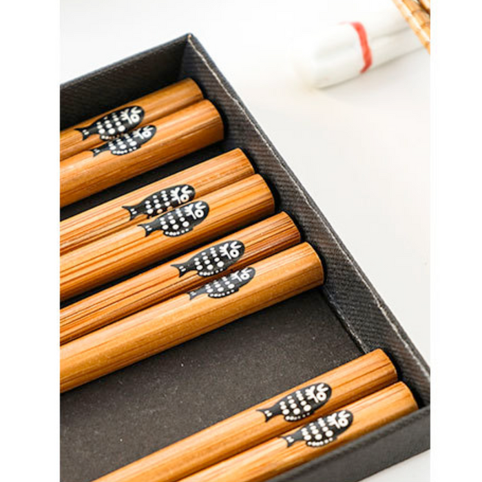 Japanese Wooden Chopsticks: black, red Japanese-style cartoon/graphic motifs, Japanese-inspired decorative graphic style