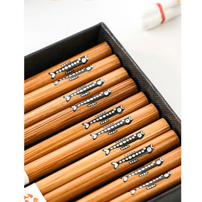 Japanese Wooden Chopsticks: black, red Japanese-style cartoon/graphic motifs, Japanese-inspired decorative graphic style