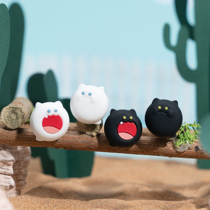 Kawaii Cat Joystick Caps for Switch: white, black cat-like cartoon characters, kawaii cartoon style