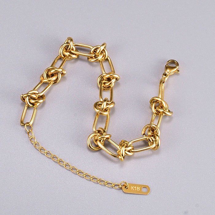 Knot-Embellished Chain Link Bracelet: gold bracelet, minimal style