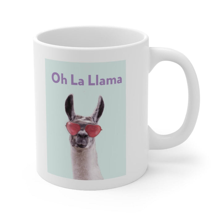 La Llama Oh Mug: white, light blue llama, cartoon-like novelty graphic style