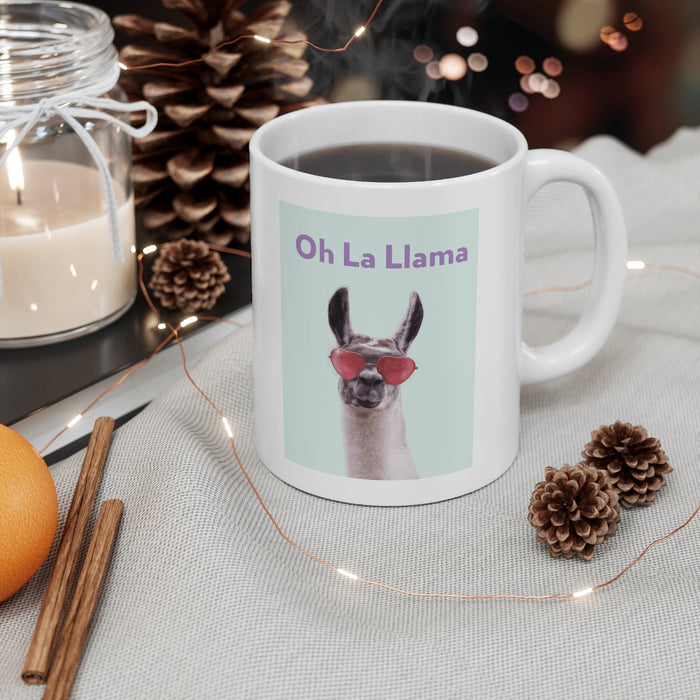 La Llama Oh Mug: white, light blue llama, cartoon-like novelty graphic style
