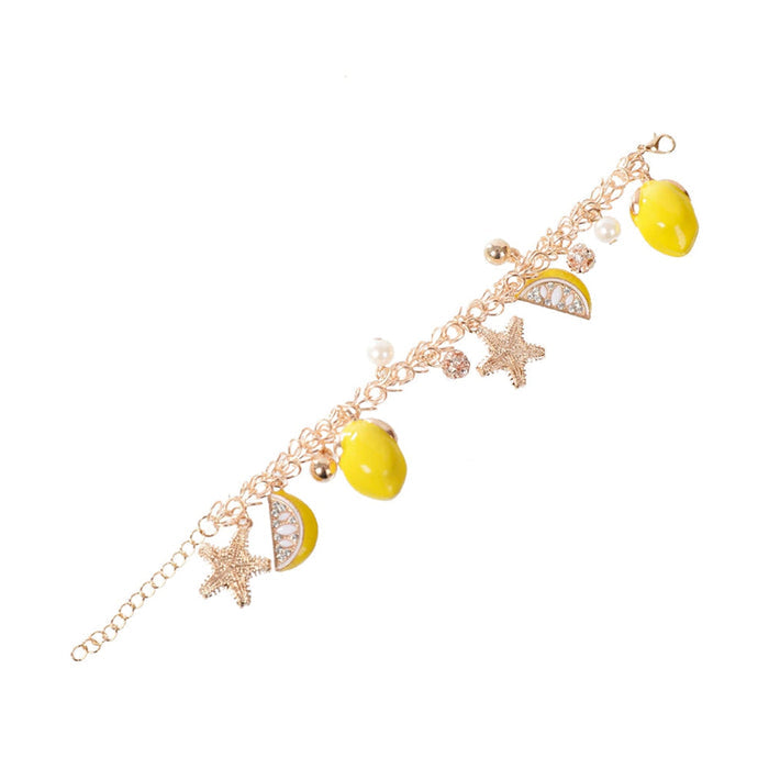 Lemon and Starfish Chain Bracelet: gold, yellow starfish and citrus fruit theme, playful nautical summer charm jewelry style