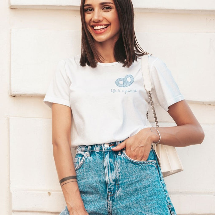 Life's a Twisted T-Shirt for Women: white, light blue pretzel graphic and coffee-themed text, minimal casual graphic style