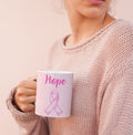 Magical Heat Sensitive Color Changing Mug with Pink Ribbon Hope Design: black, white breast cancer awareness theme, minimal a