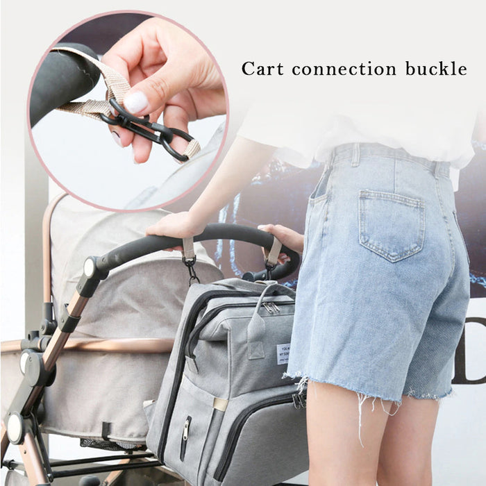 Multi-Purpose Baby Bed Stroller Bag: gray, dark gray convertible baby bag with fold-out crib, modern functional style