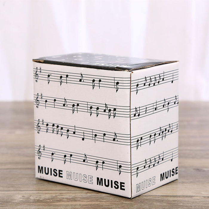 Musical Inspiration Ceramic Coffee Mug with Piano Lid: cream white, black musical notation theme, music-themed graphic style