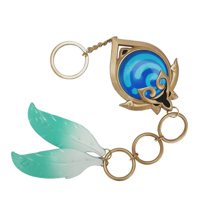 Nilou Vision Keychain: Genshin Impact Charm: gold, blue Hydro Vision themed design, fantasy game-inspired, ornate style