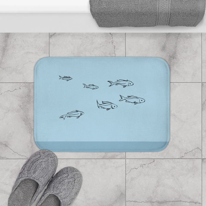 Oceanic Fish Bath Mat: light blue, dark blue-gray fish, minimal cartoon style