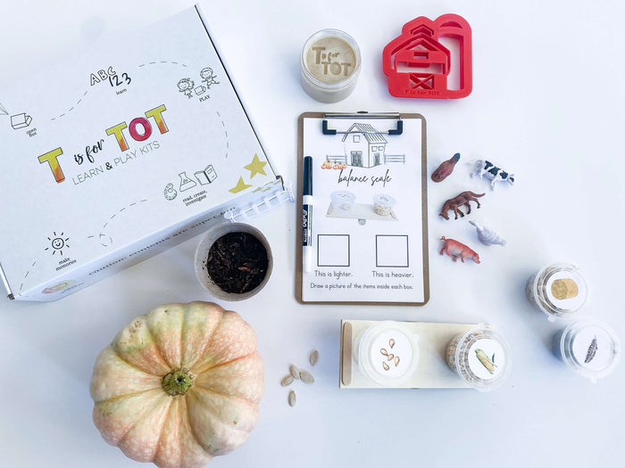 Interactive farm play kit for children with non-toxic playdough, barn playdough cutter, and a playdough farm mat. Includes farm animals, a balance scale, and a Grow Your Own Pumpkin kit. Comes with 'Farm Animals' book, farm-themed clipboard, and a STEAM & Recipe Card.