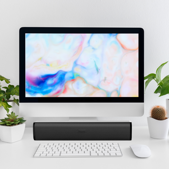 Portable Speaker for Desktop PCs: Enhancing Sound On-the-Go: black, dark gray portable speaker, minimal style