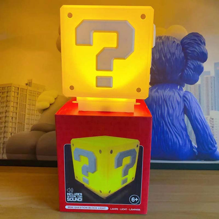 Question Mark LED Light with Sound: bright yellow, orange-yellow Super Mario question block, cartoon/video game themed style