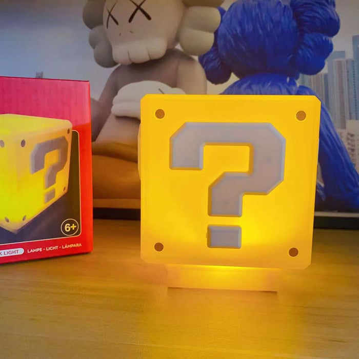 Question Mark LED Light with Sound: bright yellow, orange-yellow Super Mario question block, cartoon/video game themed style