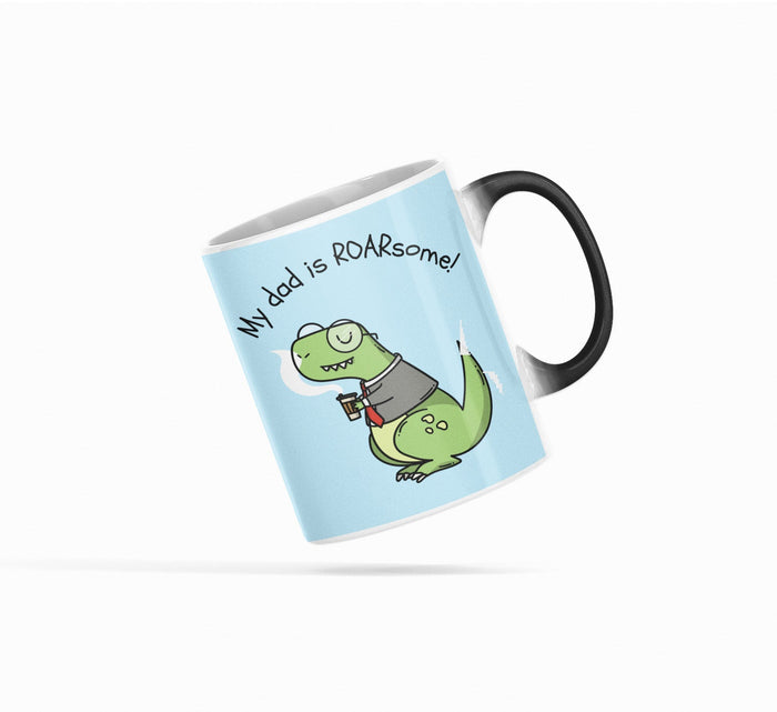 Roarsome Dad Heat Sensitive Mug, Changes Color!: light blue, black cartoon dinosaur
