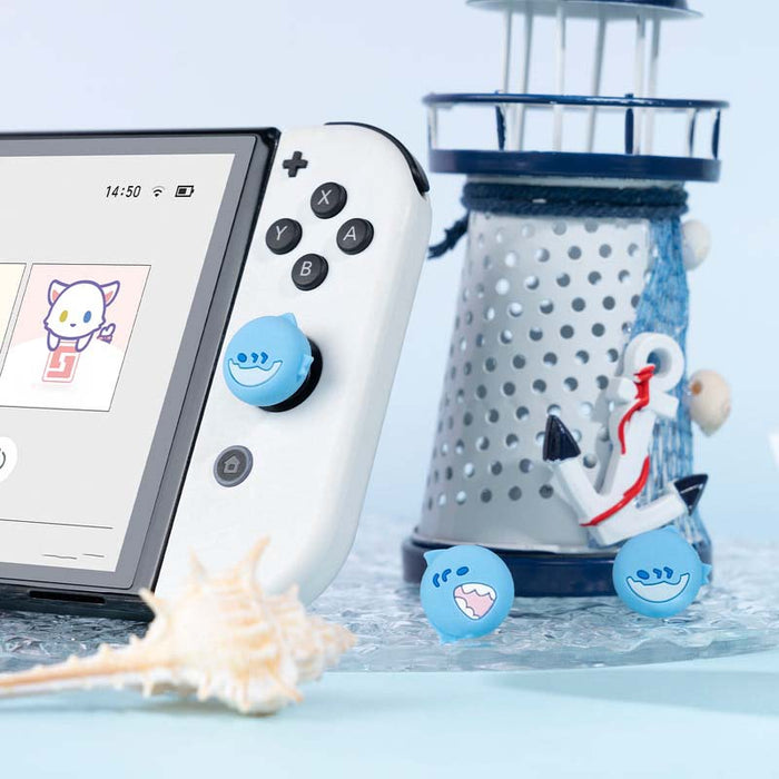 Sea Creature Switch Thumb Grips with Joystick Caps: light blue, white cartoon shark faces, cartoon, kawaii style