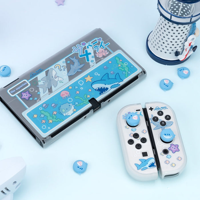 Sea Creature Switch Thumb Grips with Joystick Caps: light blue, white cartoon shark faces, cartoon, kawaii style