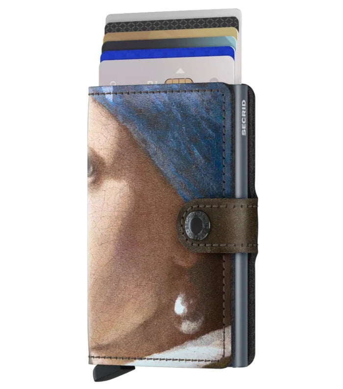 Card Protector holds  4 embossed or 6 flat cards