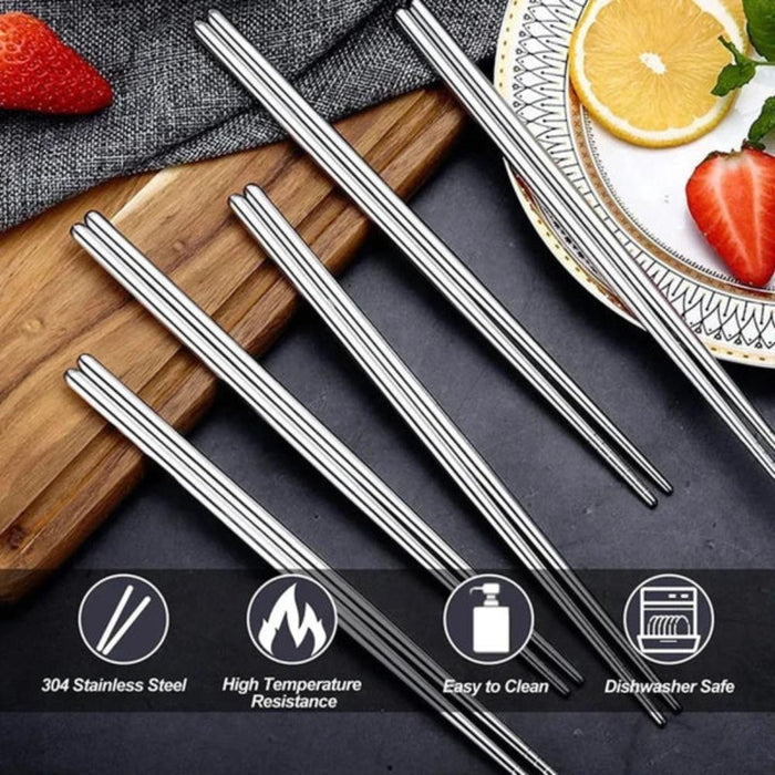 Set of 5 Pairs of Stainless Steel Chopsticks from Korea: golden brown, brown plate of stir-fried noodles, food photography st