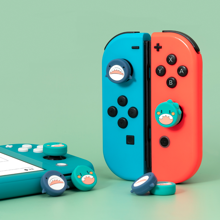 Shark Switch Joystick Caps with Cute Cat Designs: turquoise, coral red cartoon shark character, kawaii cartoon style