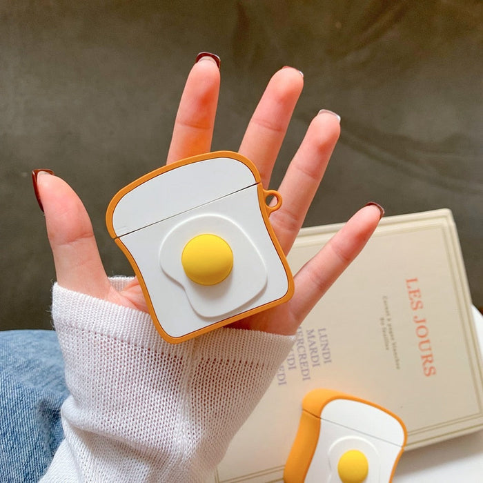 Silicone Airpods Case with Cartoon Design: white, orange fried egg theme, cute cartoon style