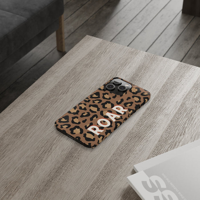 Slim iPhone Case with Leopard Print Design: tan, black leopard print, bold graphic animal print style