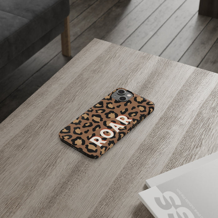 Slim iPhone Case with Leopard Print Design: tan, black leopard print, bold graphic animal print style